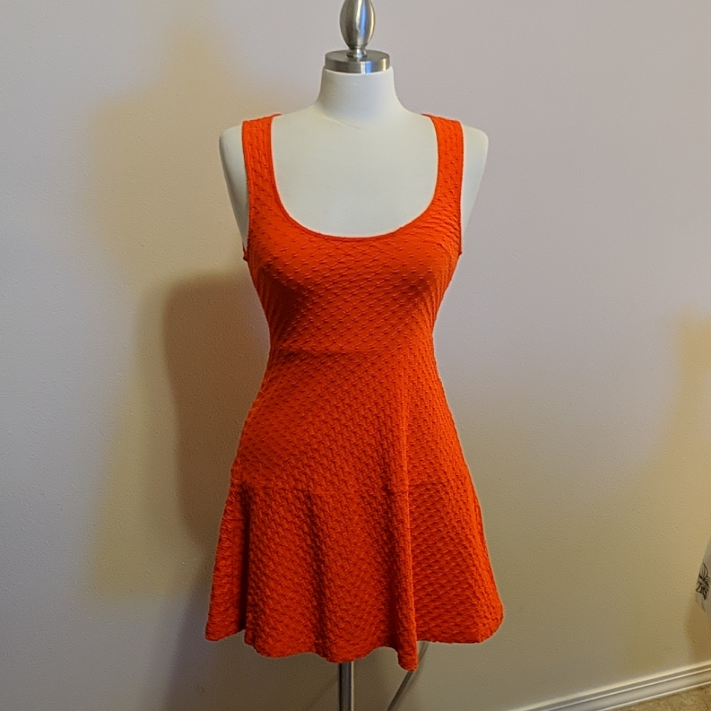 Orange skater dress with sheer back panel